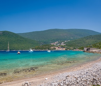 Beautiful bay of Adriatic sea with recreational boats at anchor Beautiful bay of Adriatic sea with recreational boats at anchor