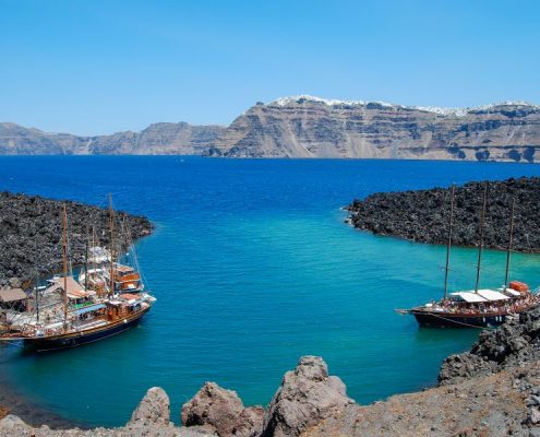 A view of Fira, Santorini from a volcanic island
