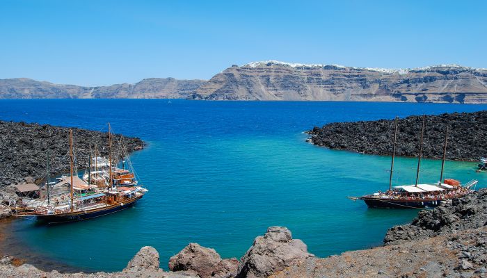 A view of Fira, Santorini from a volcanic island