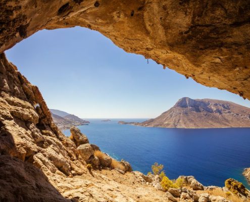 View of Telendos island from a cave in a cliff, Kalymnos island, Greece.