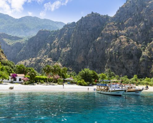 BUTTERFLY VALLEY BEACH TURKEY - Tourists visit famous Butterfly Valley beach near Oludeniz in Turkey on JUNE 01 2016. Butterfly Valley beach is one of the best beaches in Turkey