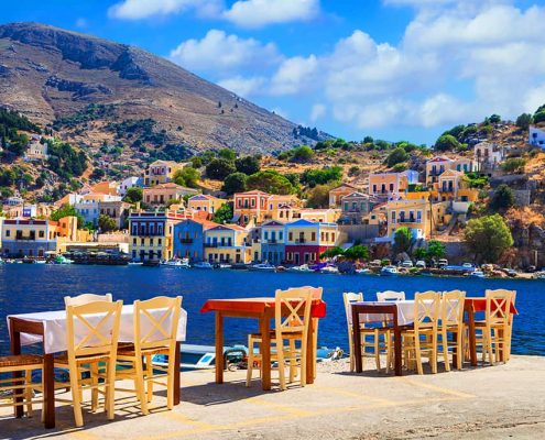 Traditional Greece - small street tavernas in Symi island, Dodec